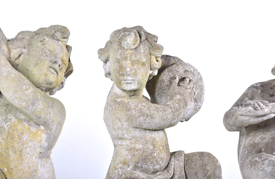 A set of four 20th century Italian musical cherub stoneware sculptures each seated on a sphere, - Image 9 of 17