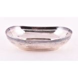 An Edwardian silver fruit bowl Sheffield 1909, by Atkin Brothers, of rounded rectangular form,