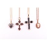 A 14ct yellow gold and sapphire cross pendant suspended on a 14ct yellow gold chain, together with a