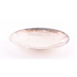 A Georg Jensen silver footed dish the body plain form is decorated with a lightly beaten finish,