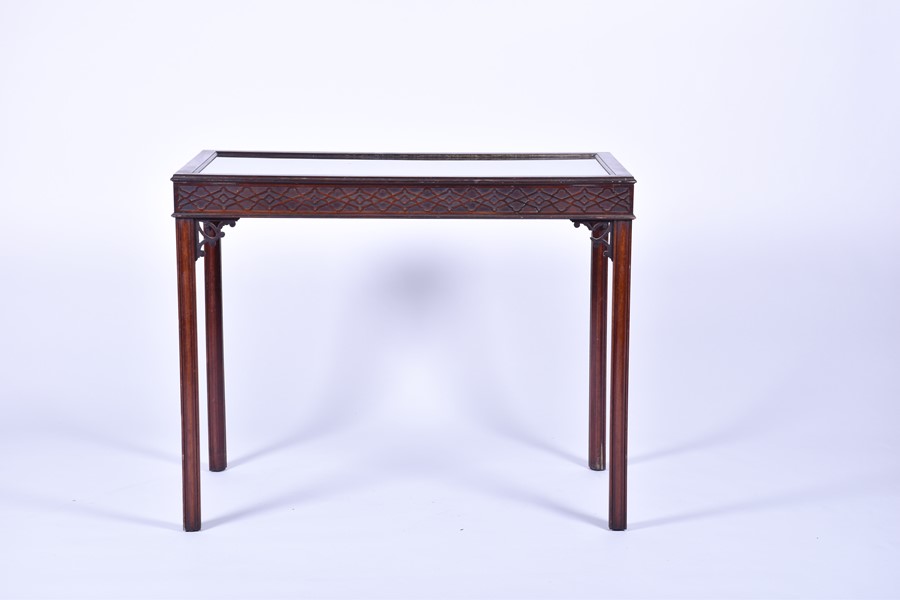 An Edwardian mahogany bijouterie table with carved frieze and glazed cover, on four shaped square - Image 2 of 10