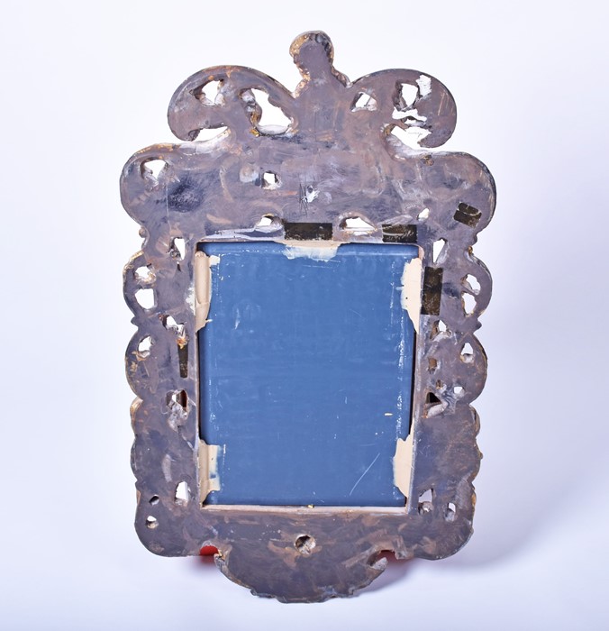 A 19th century style giltwood framed Italian wall mirror modelled with winged and musical cherubs on - Image 3 of 5