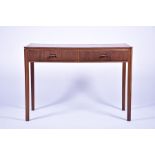 A 1960s oak and pine console table the two front drawers with fluted detail, the body raised on