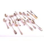 A collection of various silver flatware items comprising eighteen silver spoons, a fork and a knife,