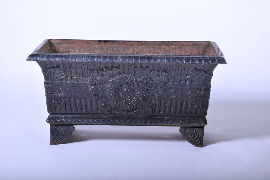 A pair of 20th century cast iron planters of square form with panels of raised foliage motifs and - Image 2 of 12