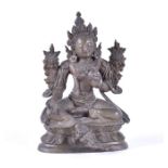 A fine Tibetan patinated bronze figure of Tara Qing dynasty, cast seated in lalitasana on a double