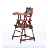 A child's Edwardian metamorphic high chair with turned legs and spindles, 99 cm high.