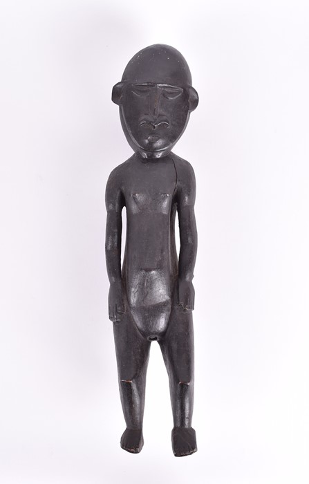 A carved African fertility sculpture modelled as an animalistic figure, 31.5 cm high, together - Image 2 of 20