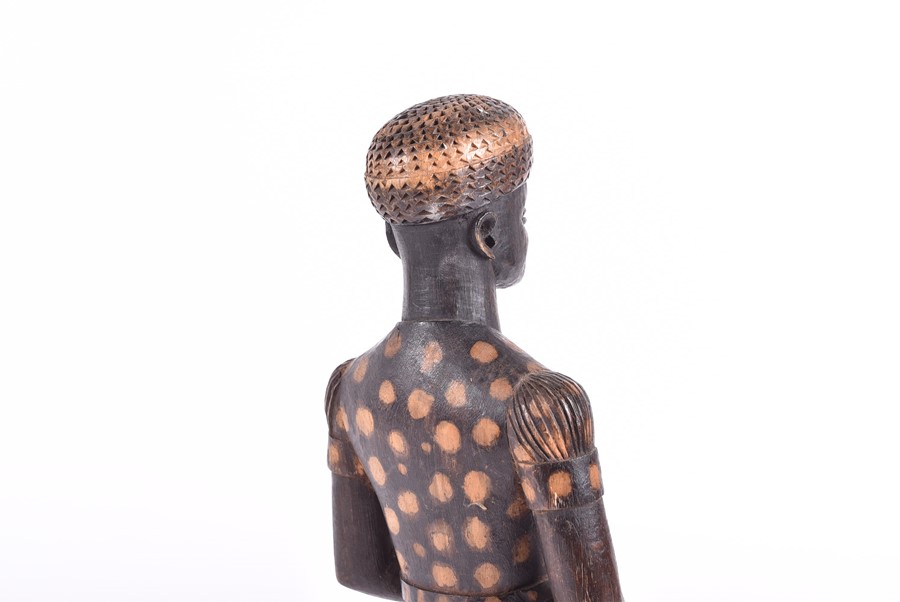 A carved African fertility sculpture modelled as an animalistic figure, 31.5 cm high, together - Image 14 of 20