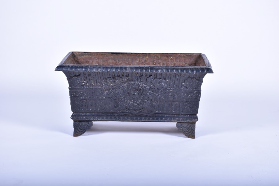 A pair of 20th century cast iron planters of square form with panels of raised foliage motifs and - Image 3 of 12