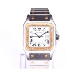 A Cartier Santos gold and stainless steel automatic wristwatch the square dial with black Roman