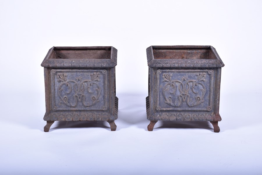 A pair of 20th century cast iron planters of square form with panels of raised foliage motifs and - Image 7 of 12