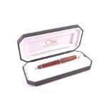 An Italian Omas Paragon fountain pen with faceted Snakewood body, Omas 18K white gold extra fine