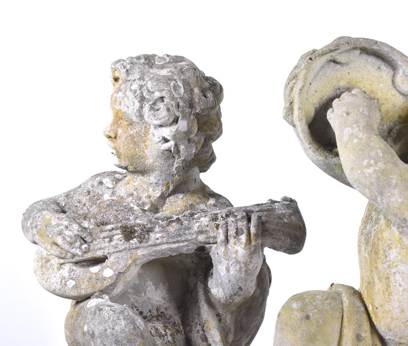 A set of four 20th century Italian musical cherub stoneware sculptures each seated on a sphere, - Image 7 of 17