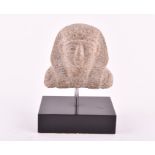 A Grand Tour Egyptian stone head of a Pharaoh possibly modelled as Amenhotep III, mounted of a