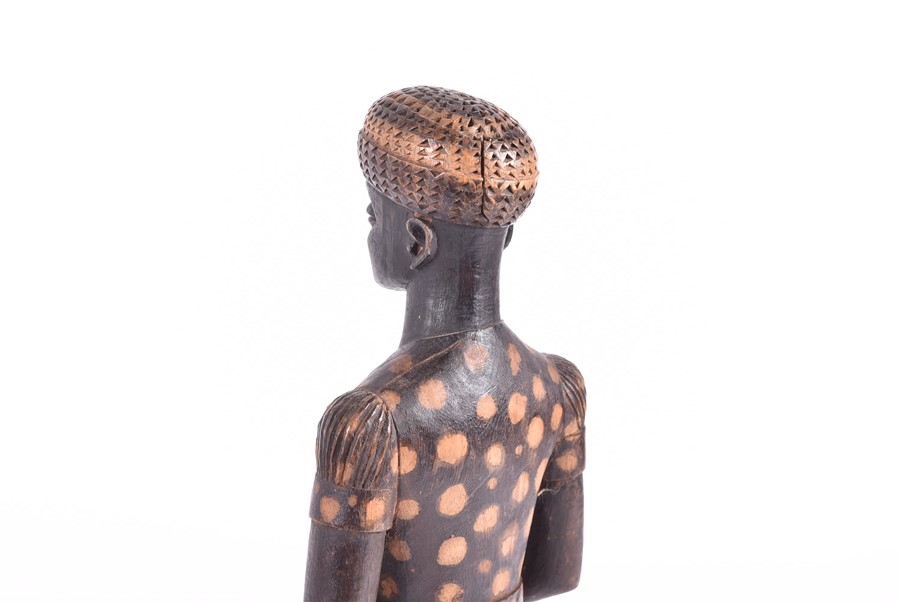 A carved African fertility sculpture modelled as an animalistic figure, 31.5 cm high, together - Image 15 of 20
