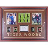 A 2005 Tiger Woods signed and framed golf presentation set marking his win at the 2005 Masters in
