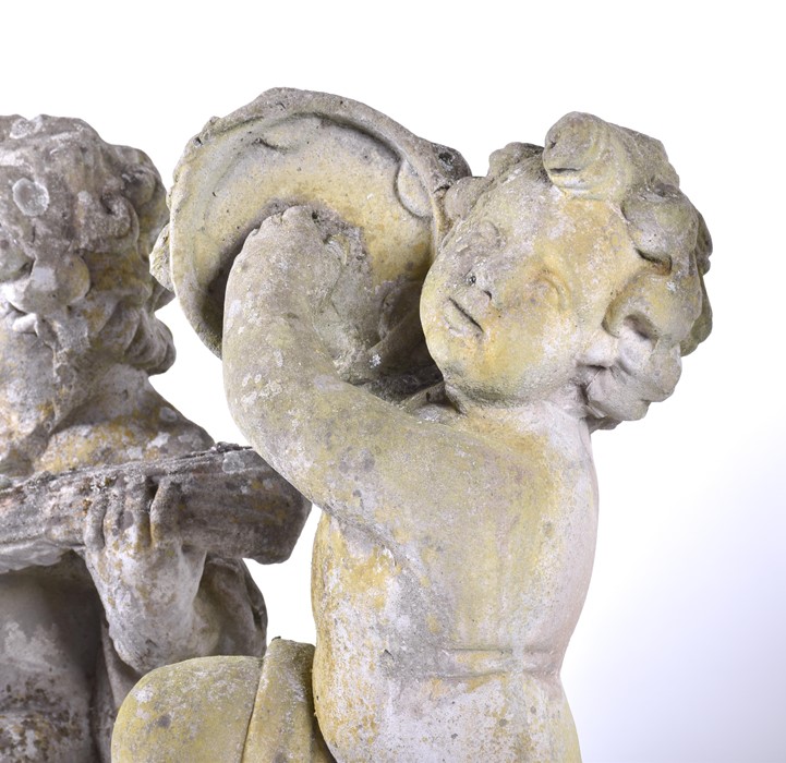 A set of four 20th century Italian musical cherub stoneware sculptures each seated on a sphere, - Image 8 of 17