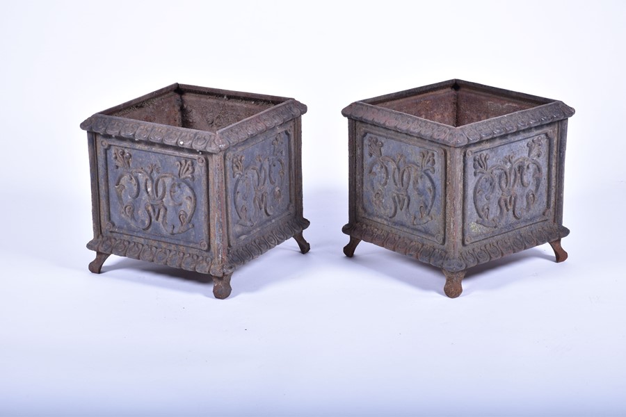 A pair of 20th century cast iron planters of square form with panels of raised foliage motifs and - Image 8 of 12