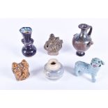 A collection of early Chinese pottery to include a miniature amphora vase with dark lustre glaze,