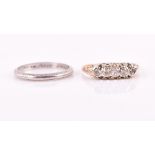 A solitaire diamond ring set with a round-cut stone of approximately 0.55 carats, approximately I/J,