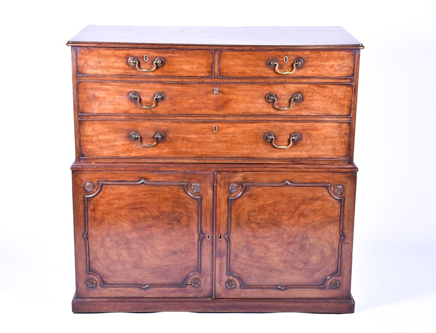 A George III period mahogany desk secretaire in the manner of Thomas Chippendale, the drop front top