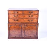 A George III period mahogany desk secretaire in the manner of Thomas Chippendale, the drop front top