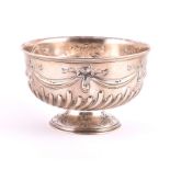 An Edward VII silver pedestal rose bowl Sheffield 1906, by Mappin & Webb, the circular shaped bowl