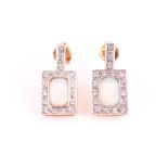 A pair of 18ct yellow gold, diamond and opal earrings of rectangular form, 1.6 cm long, 3 grams.