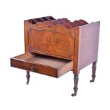 An unusual Regency mahogany Canterbury with four division, panel front and sides, and a single