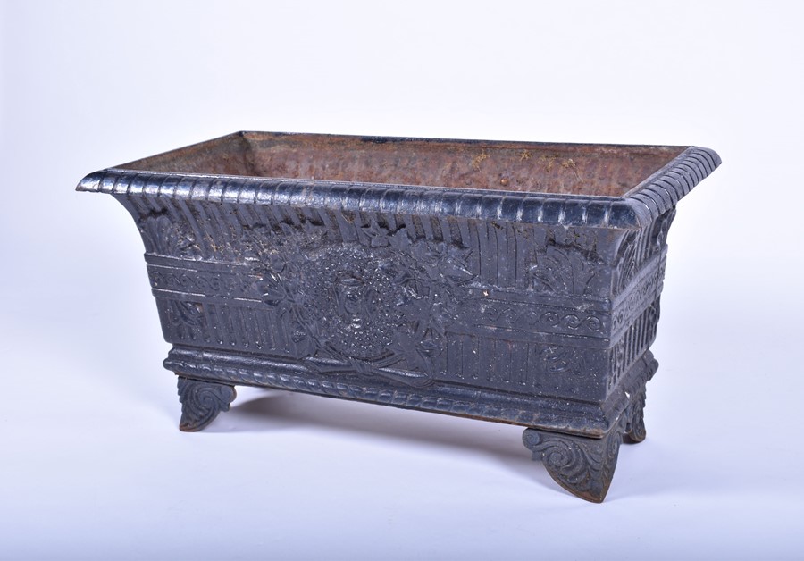 A pair of 20th century cast iron planters of square form with panels of raised foliage motifs and - Image 4 of 12