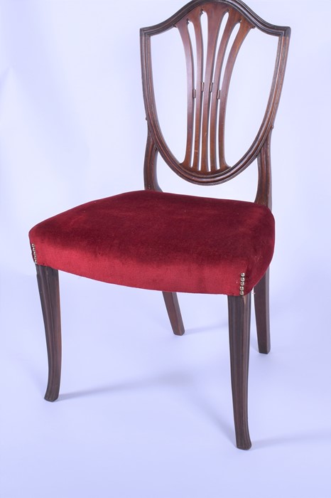 A set of four mahogany Hepplewhite style shield back dining chairs with overstuffed seats, on - Image 3 of 4