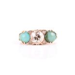 A late 19th / early 20th century 18ct yellow gold, diamond, and turquoise ring centred with an old-