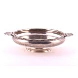 A silver centrepiece bowl Birmingham 1989, by Albert Edward Jones, of circular globular form, on a