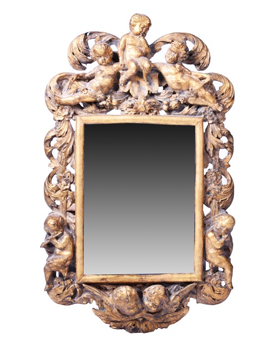 A 19th century style giltwood framed Italian wall mirror modelled with winged and musical cherubs on