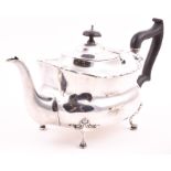 An Edwardian two-piece silver part tea set Birmingham 1912, by Williams Ltd, comprising a tea pot