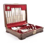 A collection of cased British silver flatware to include twenty seven 1960s Sheffield silver cutlery