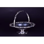 An Edwardian silver silver swing handle pedestal bowl London 1906, by William Hutton & Sons Ltd, the