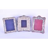 Two late 20th century English silver mounted frames comprising one with embossed Neoclassical scenes