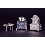 A late Victorian novelty silver box modelled as an 18th century Continental bookcase Sheffield 1900,