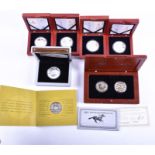 A group of four 2008 Beijing Olympics Commemorative silver 1oz 10 Yuan coins boxed and with