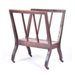 A mid 20th-century stained oak folio-browser of simple manufacture,, with four outspread legs on