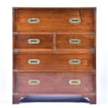 A Victorian style mahogany campaign chest the top secretaire drawer with fitted interior over two