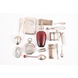 A group of various silver and white metal items to include three silver vesta cases, a silver