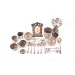 A group of various silver and white metal items to include a Chinese white metal cup on stand, a
