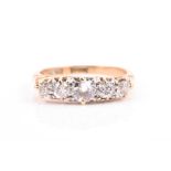 An 18ct yellow gold and diamond ring set with five graduated diamonds of approximately 0.55 carats