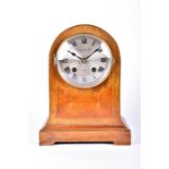 An early 20th century dome top mantel clock by Camerer Cuss & Co  in the art nouveau taste, with