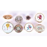 A collection of eight pill boxes  to include enamel examples by Halcyon Days and Fortnum & Mason,