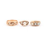 A late 19th / early 20th century 18ct yellow gold and diamond gypsy ring set with three old-cut