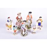 A pair of small Dresden porcelain figures modelled as musicians 13 cm high, together with a